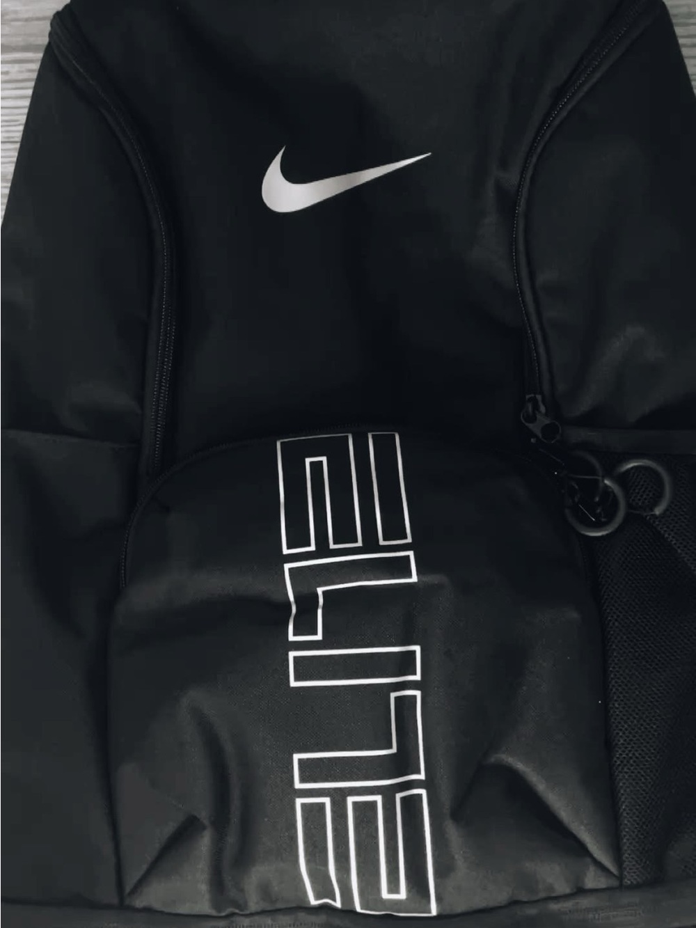 Nike Black Backpack with White Swoosh and Vertical Logo